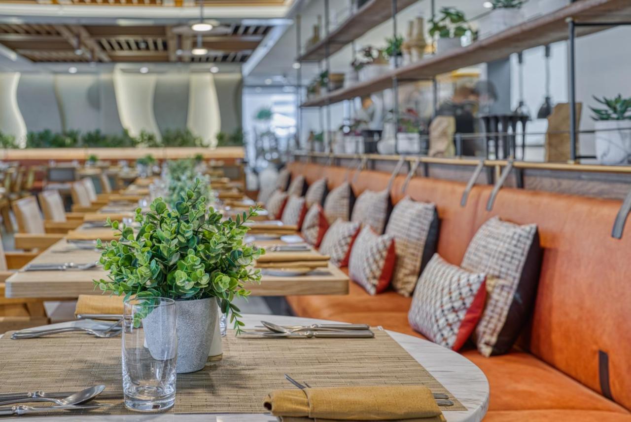 מלון The First Collection Dubai Business Bay מראה חיצוני תמונה Interior of the restaurant