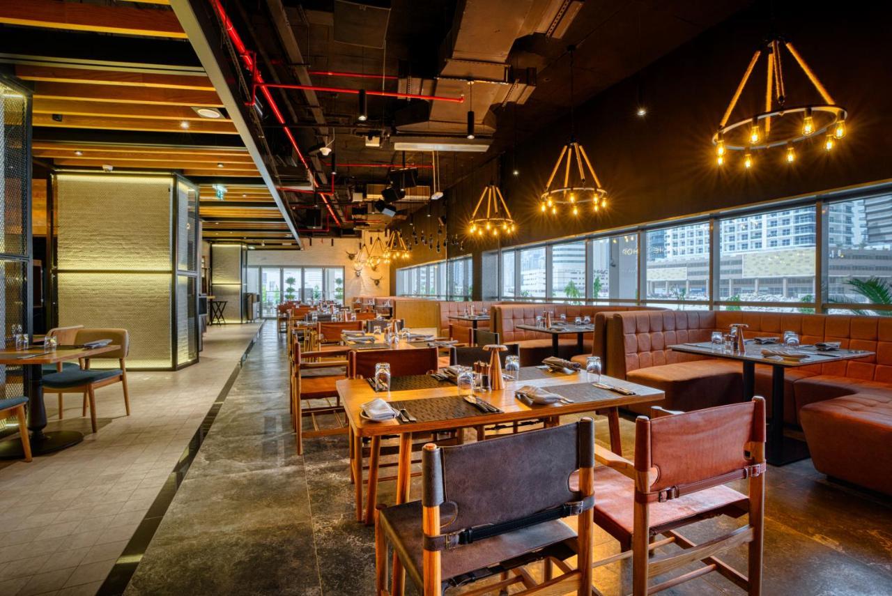 מלון The First Collection Dubai Business Bay מראה חיצוני תמונה Interior of the restaurant