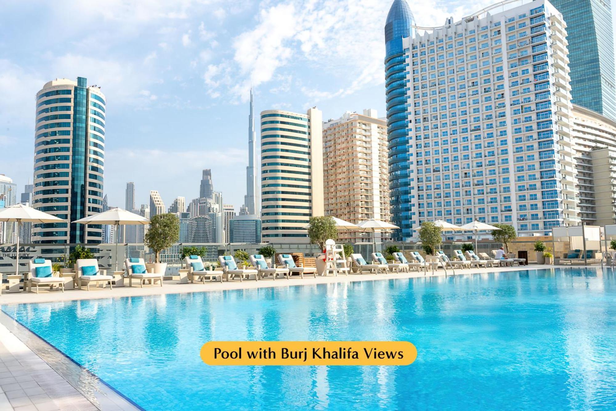 מלון The First Collection Dubai Business Bay מראה חיצוני תמונה Pool with Burj Khalifa views